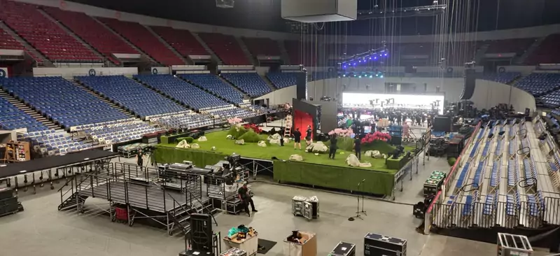 Production equipment on an arena floor during load-in